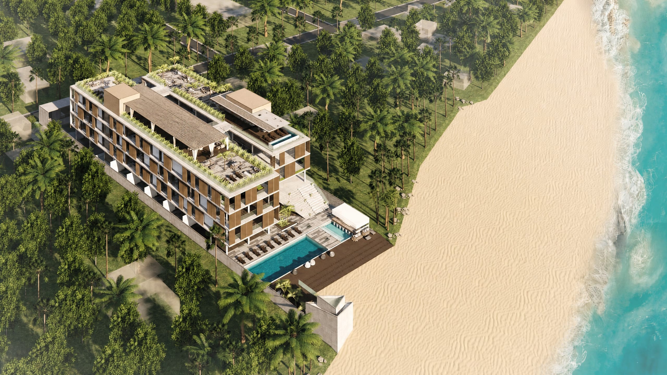 Aerial view of the resort's pool deck and beachfront dining pavilion