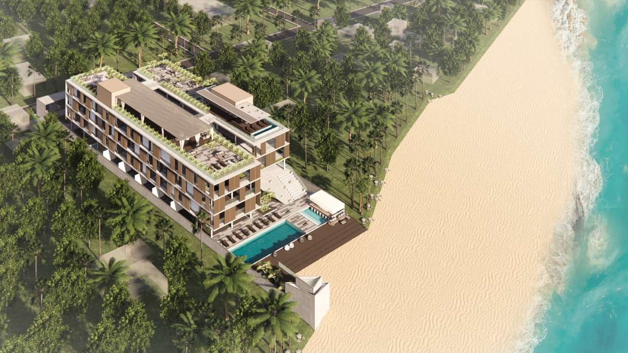 Aerial view of the resort's pool deck and beachfront dining pavilion
