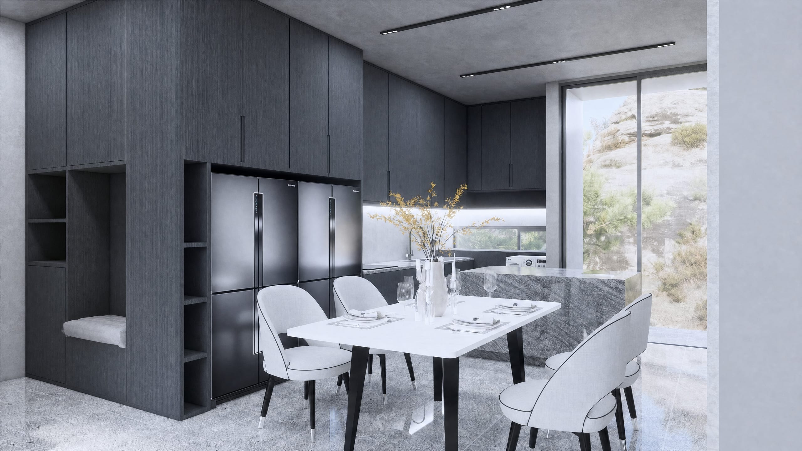 Dark-cabinetry kitchen and dining space with a hillside window