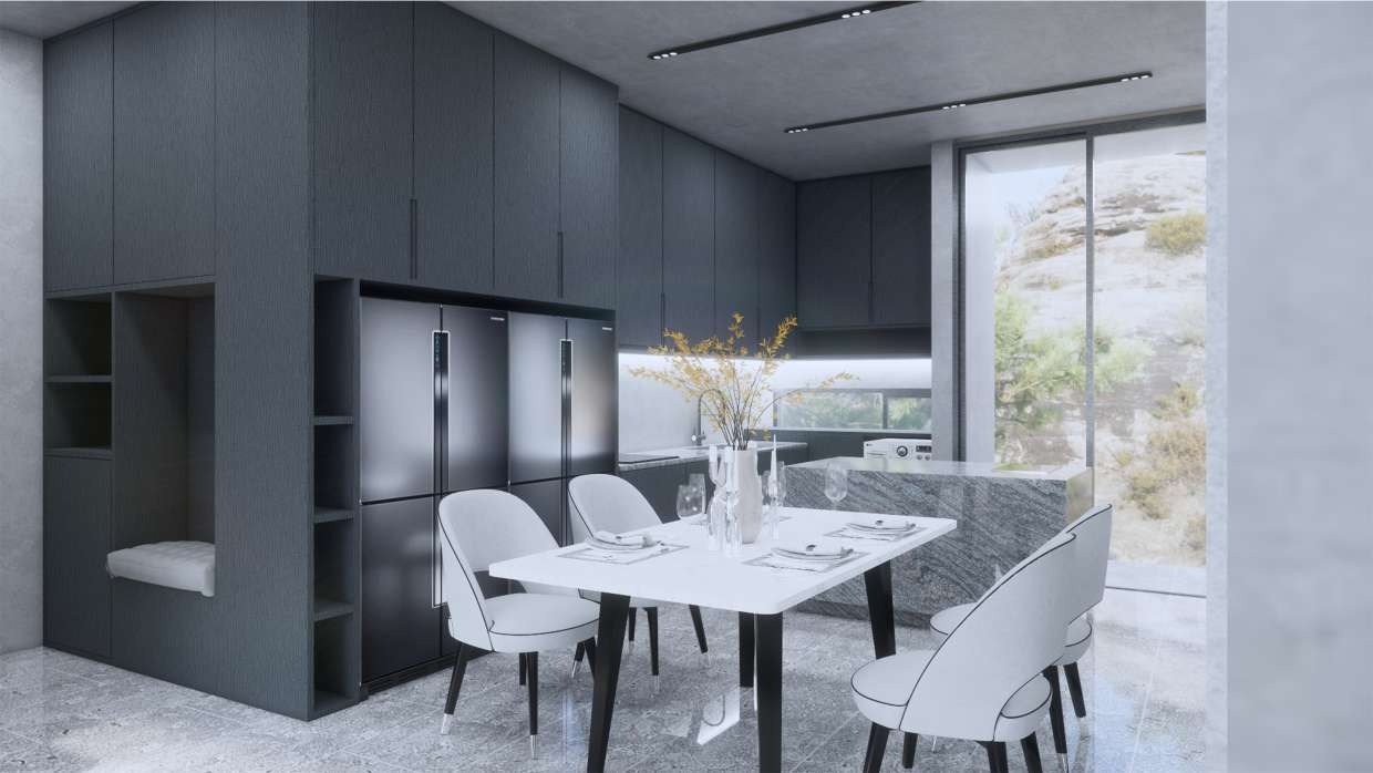 Dark-cabinetry kitchen and dining space with a hillside window