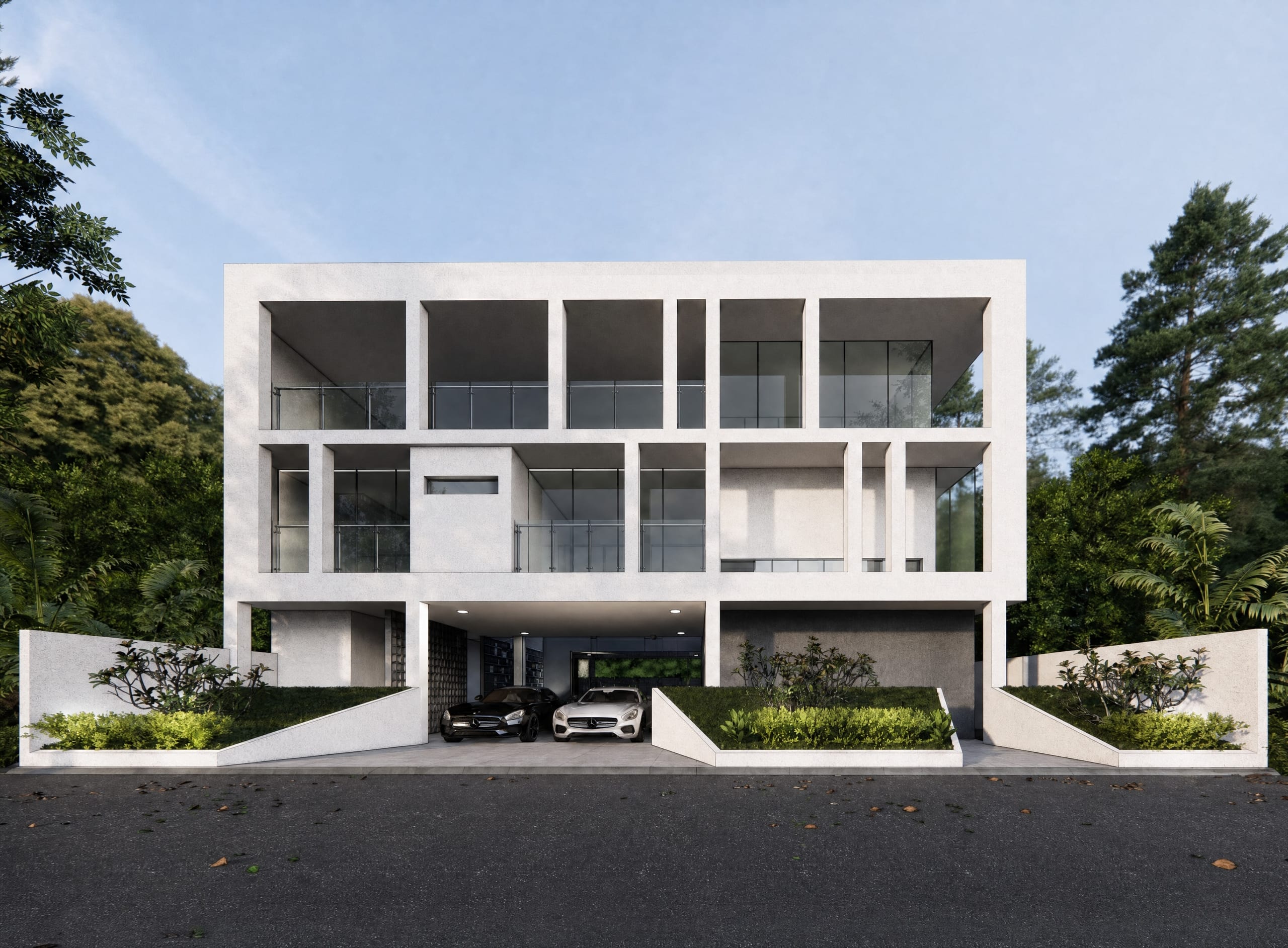 White concrete residence framed by a recessed structural grid