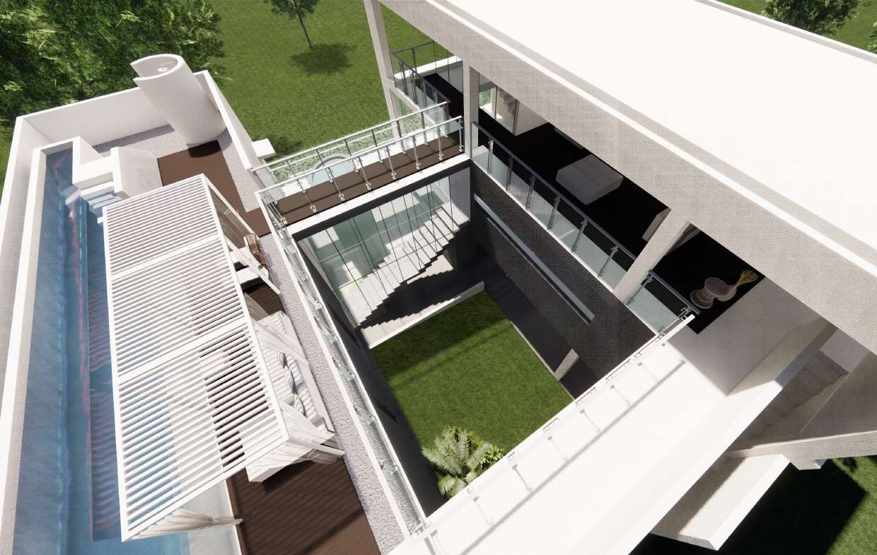 Aerial view of a residence with a lap pool and sunken courtyard